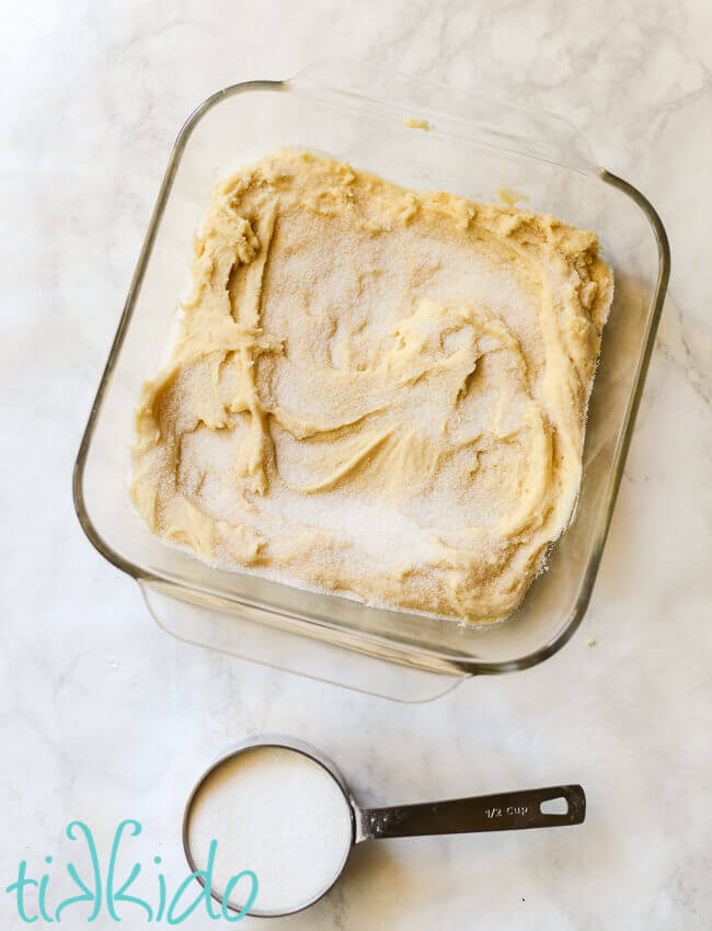 Unbaked strawberry shortcake batter in a 9x9 pyrex baking dish.