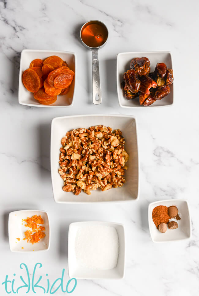 Ingredients for Sugar Plums on a white marble surface.