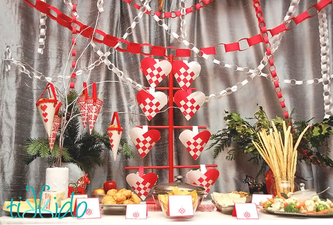 Swedish Paper Hearts on a Swedish cookie tree, set out in a buffet.