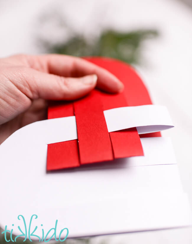 Swedish paper heart basket being woven together.