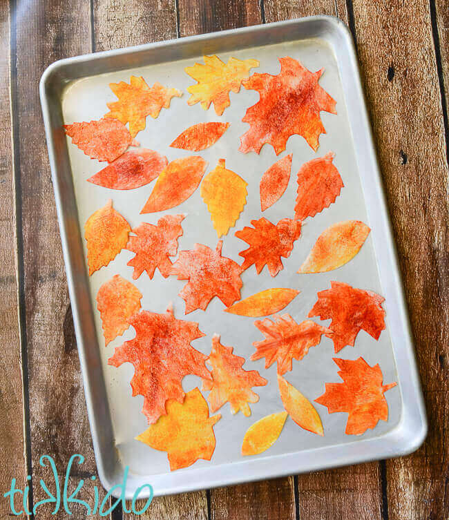 Wafer paper fall leaves drying in a metal sheet pan.