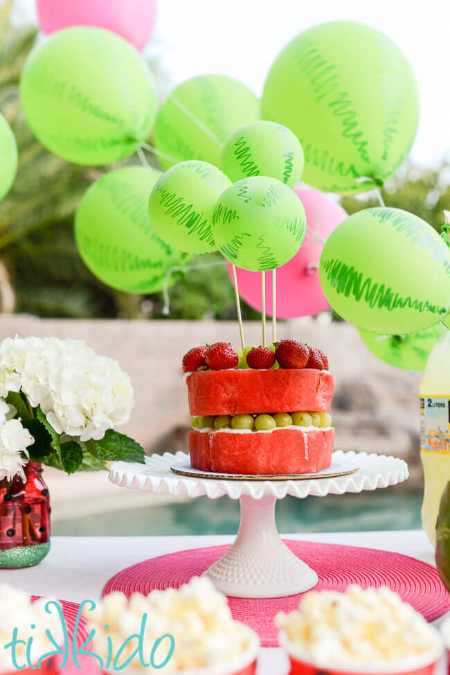 Watermelon and other fruit cut and arranged to look like a layer cake at the watermelon party.