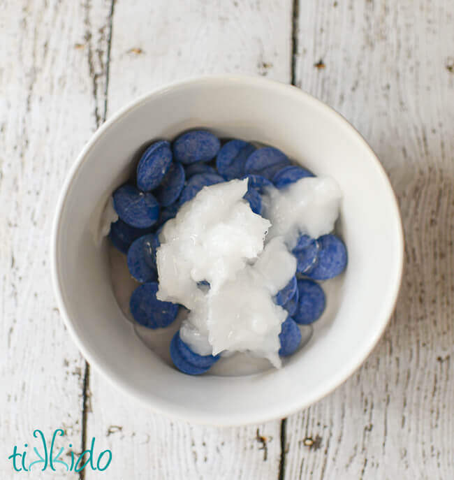 Ingredients for Blue Magic Shell Ice Cream Topping in a microwave safe bowl.
