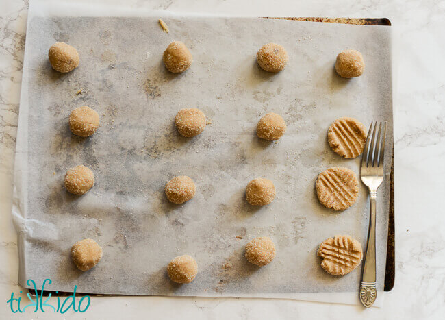 Browned Butter Cookies being shaped with a fork.