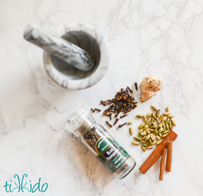 Homemade chai spices and a mortar and pestle