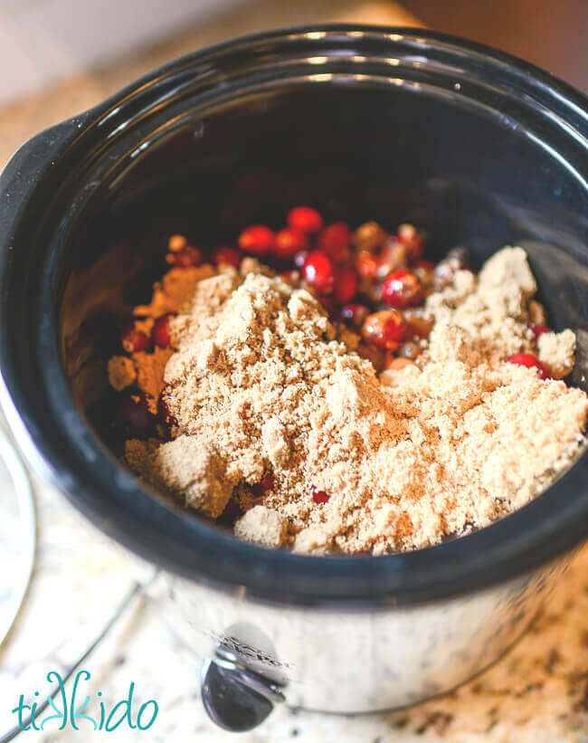 Cranberry butter ingredients in a crock pot