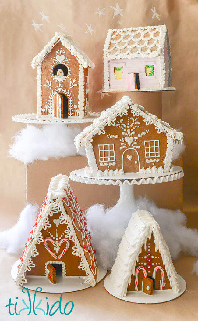 Five gingerbread houses in different sizes and shapes.