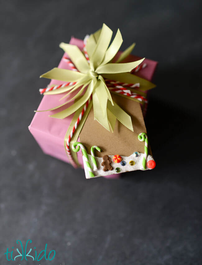 DIY Christmas Gift Tag inspired by gingerbread houses on a Christmas present.
