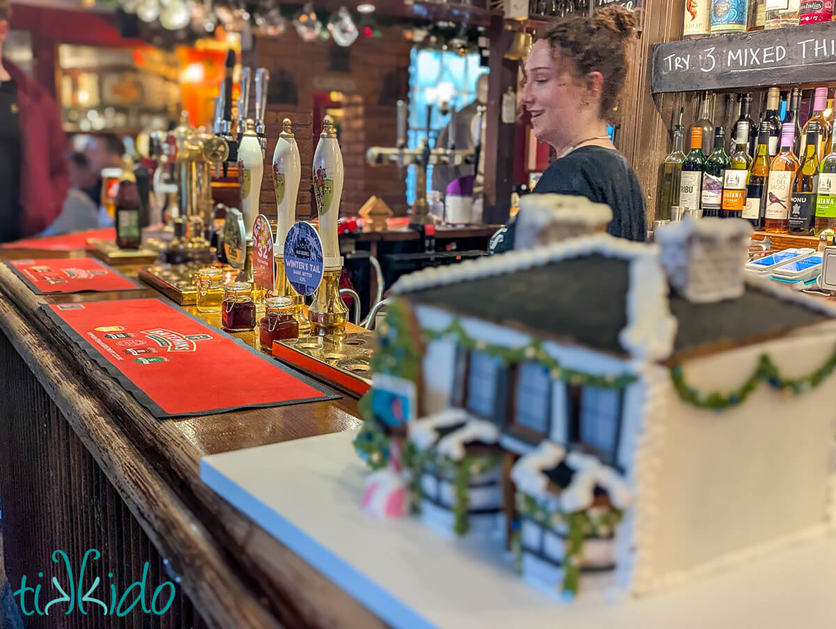 The gingerbread replica of The Mermaid pub on the bar of The Mermaid in St Albans, England.