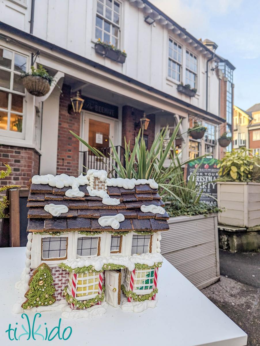 Gingerbread replica of The Beehive pub in St Albans in front of the actual pub.
