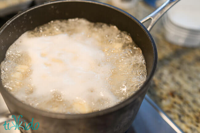 Homemade gnocchi being boiled