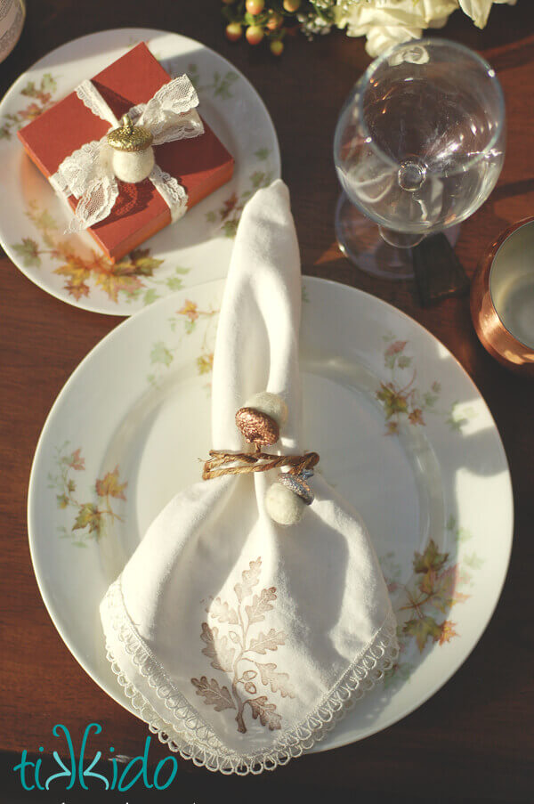 Thanksgiving table setting featuring a Felt Acorn Napkin Ring.