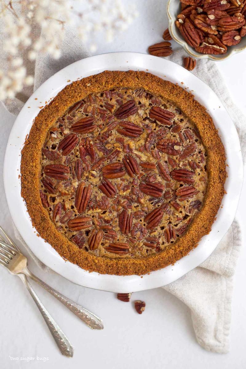 Pecan pie baked in a graham cracker crust.