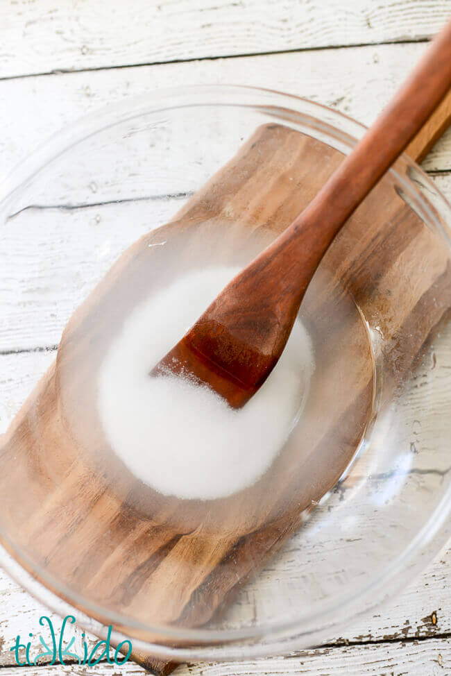 Salt dissolving in water to make salt dough ornament recipe.