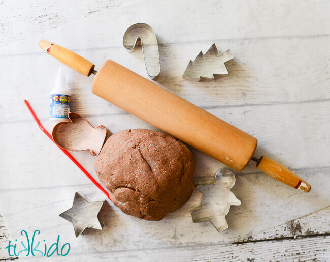 Materials for making gingerbread salt dough ornaments.