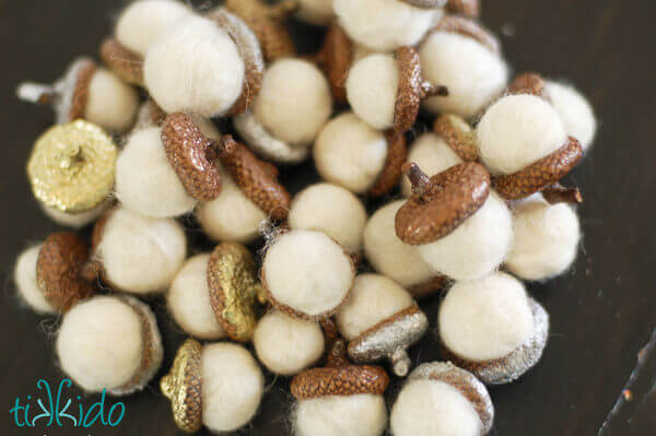 Pile of felt acorns for making Thanksgiving Napkin Rings.