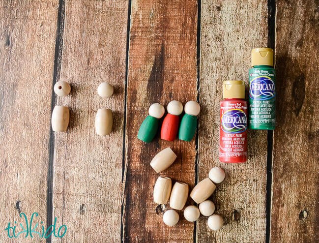 Wooden beads painted and glued together to make little people figures for the tomte ornaments.