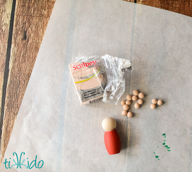 Noses for tomte Christmas elves being rolled out of Sculpey dough.