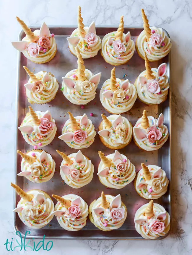 Tray of unicorn cupcakes topped with American Buttercream Frosting Recipe.