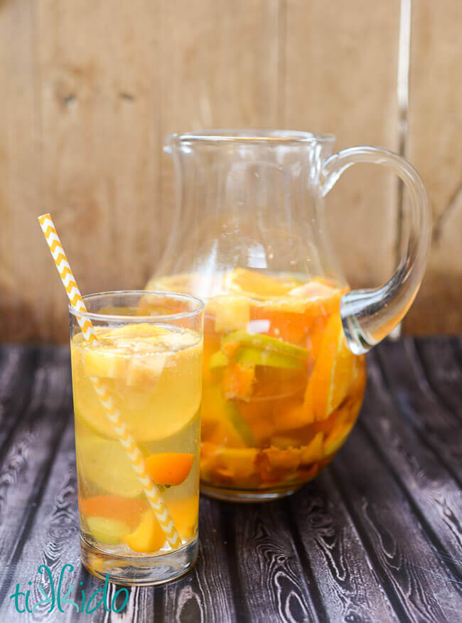 Pitcher and glass of white sangria (Spanish sangria made with white wine)